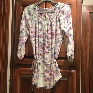 Women’s long shirt with multicolor print.